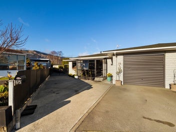 Rock Solid, Low Maintenance & Close to Everything!