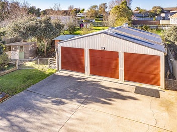 A warm wooden glow - Triple car garaging!