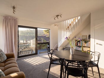 SUN-DRENCHED CORNER TOWNHOUSE WITH GARAGE