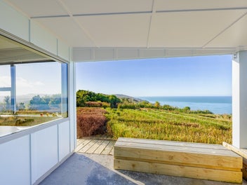Exclusive coastal living with private beach access