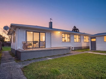 LOOK! 4 Bed on 1/4 Acre with Double Garage!