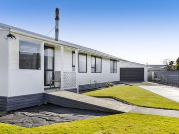 Four-bedroom home with extra-large sheds