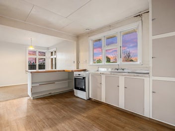 No fancy kitchen. No fresh paint. Pure potential.