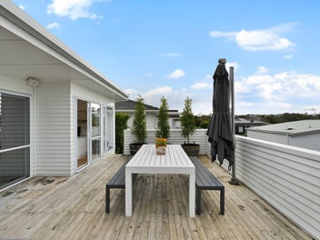 Sun-soaked family living on a freehold title