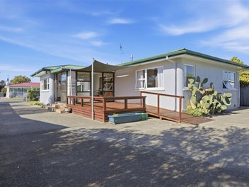 Prime and Central Location with 4-Car Garaging