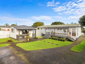 Sunny Family Living with Views of Mangere Mountain