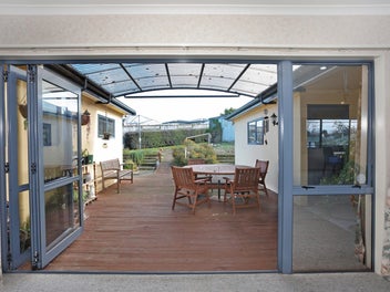 PROUDLY ELEVATED WITH VIEWS TO THE RANGES