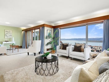 Spectacular Views! Location! Home plus Income?