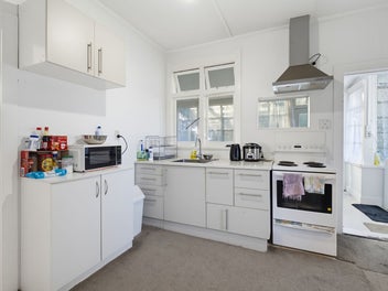 Two Bedrooms, Two Sunrooms, Great Location!