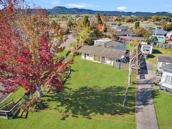 New Roof, Lake Views & Quarter-Acre Potential!
