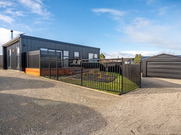Brand-New Luxury Living with Income Potential