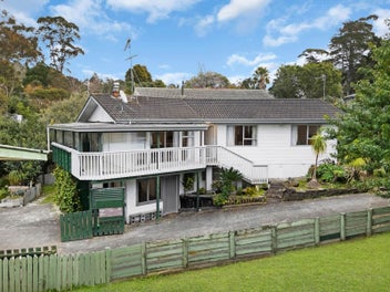 Family Home on a Generous 719m² Freehold Section!