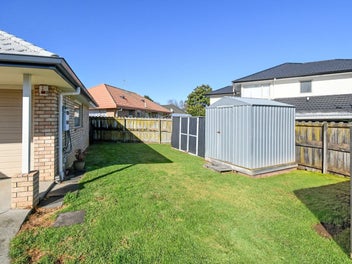 Freehold section, brick and tile, low maintenance