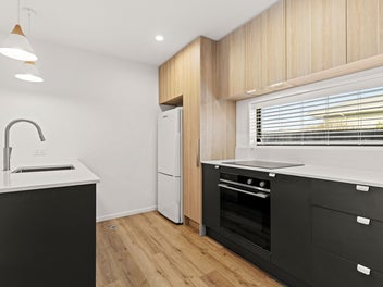 Near New, End Unit & North Facing!