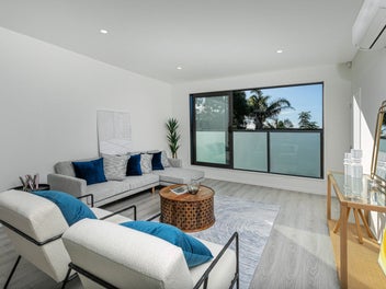 Brand new beachside living with private lift