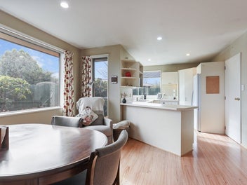 Sunny And Spacious With Double Garaging!