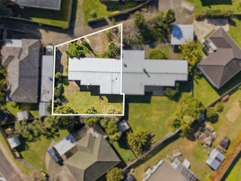 Two homes. One title.
