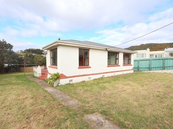 Coastal Opportunity With Space And Potential!