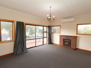 Coastal Opportunity With Space And Potential!