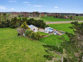Owners Moving On - Five Acre Opportunity!