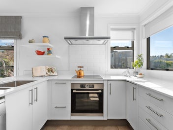 Coastal Retreat - Seconds from the Sand!