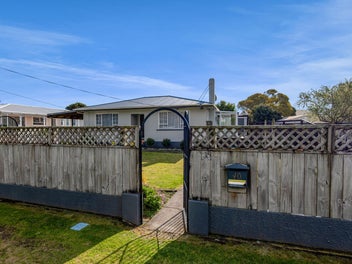 TWO HOMES, ONE MORTGAGE