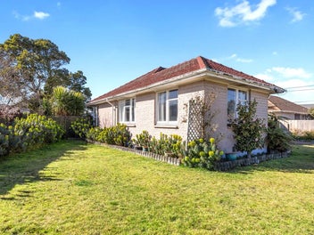 Renovation Project with Four Car Garaging!