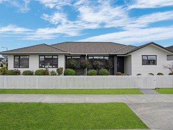 Sun-Drenched Corner Home with Dual Street Frontage