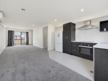 Easy-Care Newtown Living with Deck Appeal