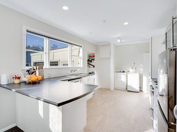 Fully Fenced, Sun-Drenched & Practical Living!