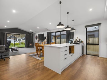 Home and income on a great corner site!