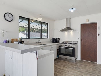 Elevated Family Living with Conservatory & Views!