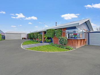 Family home with impressive garaging