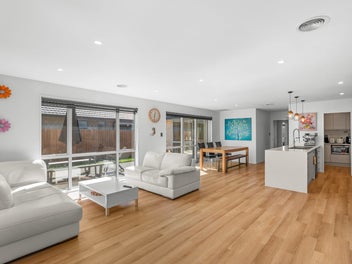 Sun-Filled Four-Bedroom Home with 2 Master Suites!