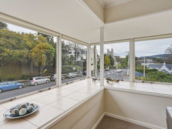 Sunny and Stylish Living with Roof Top Access!