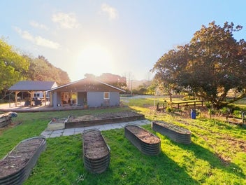 TWO HOMES. TOTAL PRIVACY. THREE ACRES OF POTENTIAL