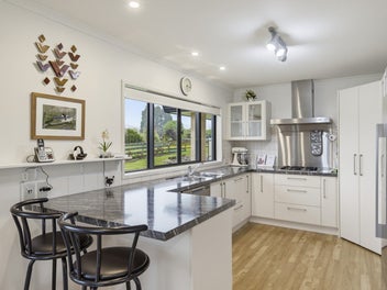 Space to live, views to love, garaging to impress