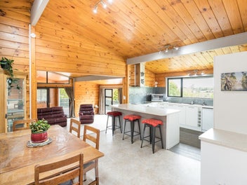 Super-sized home with four car garaging!