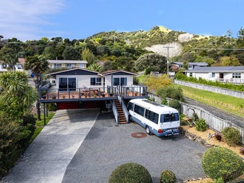 Coastal Family Home with Water Views to Wow You!