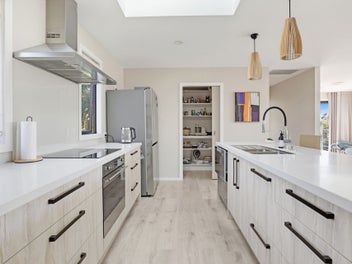 Architectural Coastal Living + Income Potential