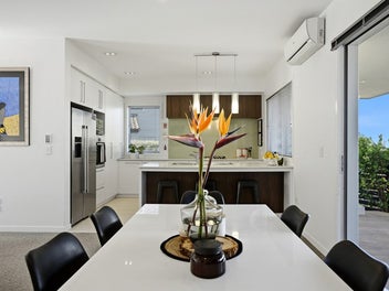 Double Garage Meets Timeless Brick Construction