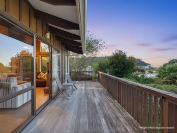 Wraparound Decks, Warm Timber & Coastal Ease