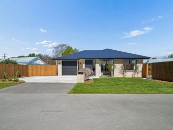 Modern Comfort, Easy Living 3-Year-Old Brick Home