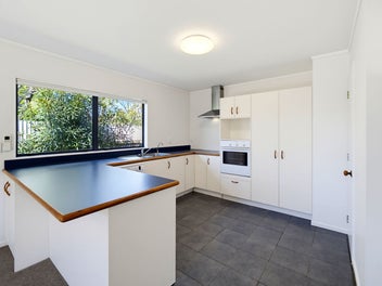 Sunlit Family Living with Space to Settle In