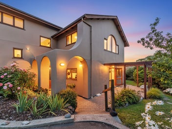 Earth-Built Elegance & Amazing Views!