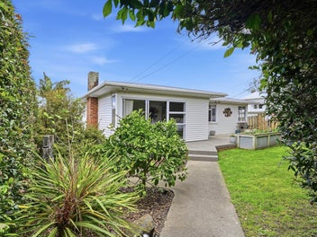 TWO HOMES FOR THE PRICE OF ONE!