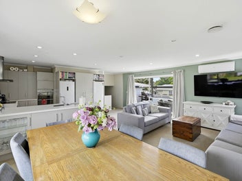 TWO HOMES FOR THE PRICE OF ONE!