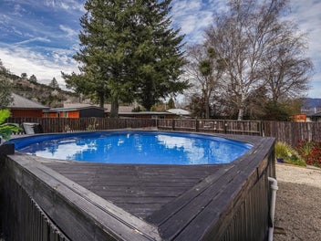 A pool, spa and alpine views