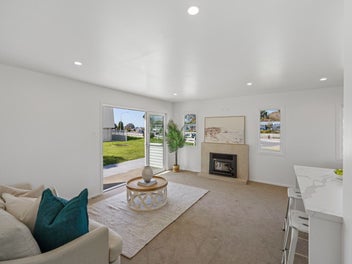 Renovated, sun-filled & full of potential