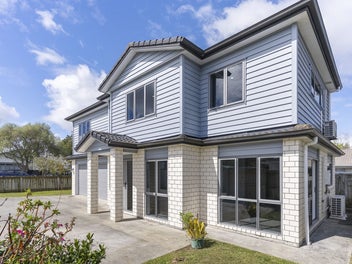 Spacious, Sun-Lit Family Home!